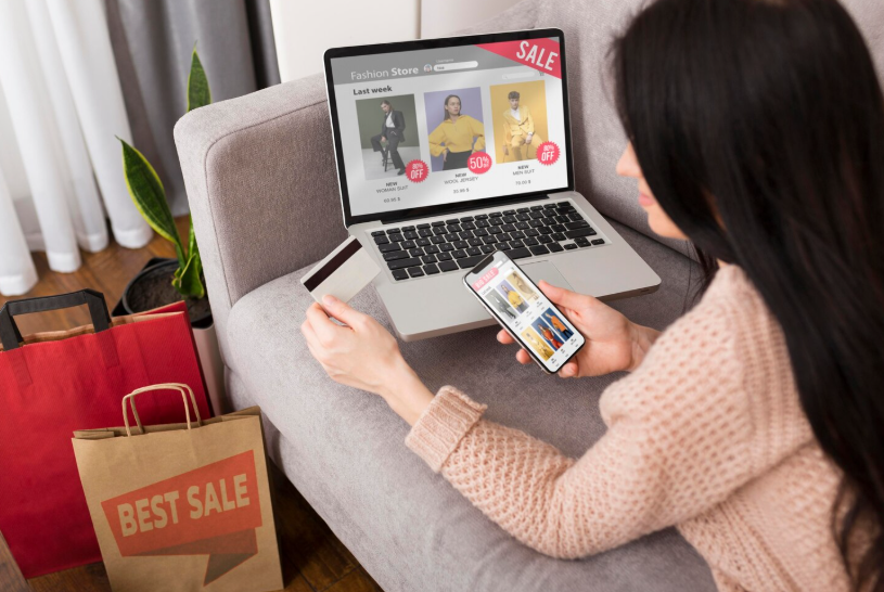 Woman shopping online during a sale, illustrating sell out search signals.