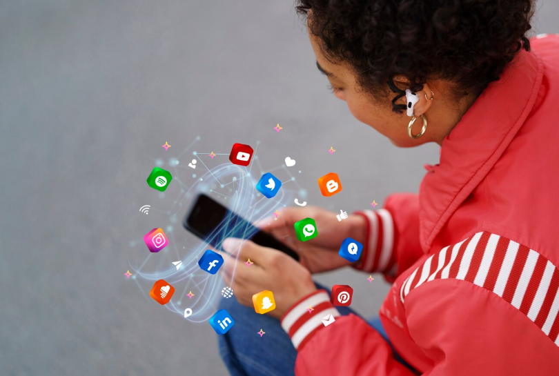 Person scrolling social media on a phone, illustrating social media search frenzies.